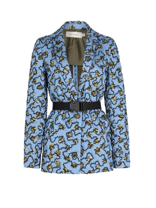 A Yarah Jacket Periwinkle with an animal print belt.