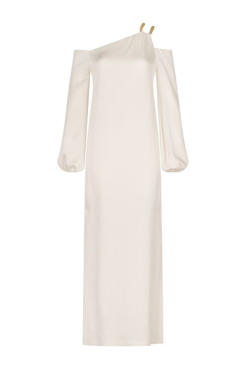 A Ada Dress White with a metallic gold shoulder detail.