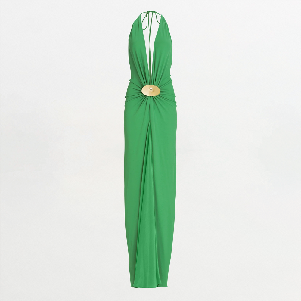 The Aiko Dress is a sleeveless green maxi in Italian fabric, featuring a halter neckline with deep V, gathered waist with round gold-tone buckle, and a floor-length skirt.