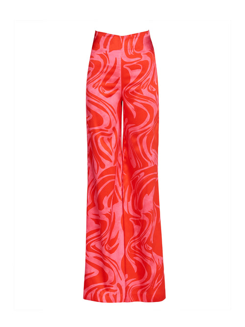 A high-waisted Andie Pant Pink Red Marble in a wide leg style.