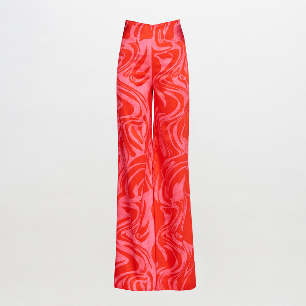 A high-waisted Andie Pant Pink Red Marble in a wide leg style.
