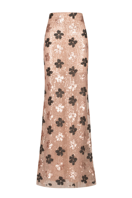 A pink Belisa Skirt Cacao Floral Sequin with black and white floral print.