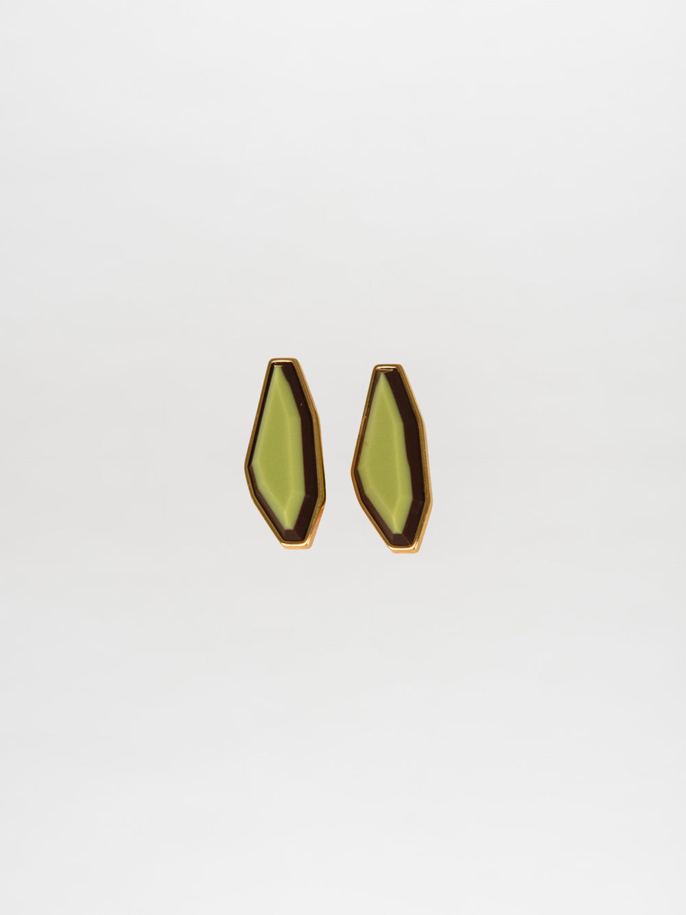 A pair of geometric Badra Earrings Lime with gold trim and faceted fantasy lime-green centers, shown on a plain white background.