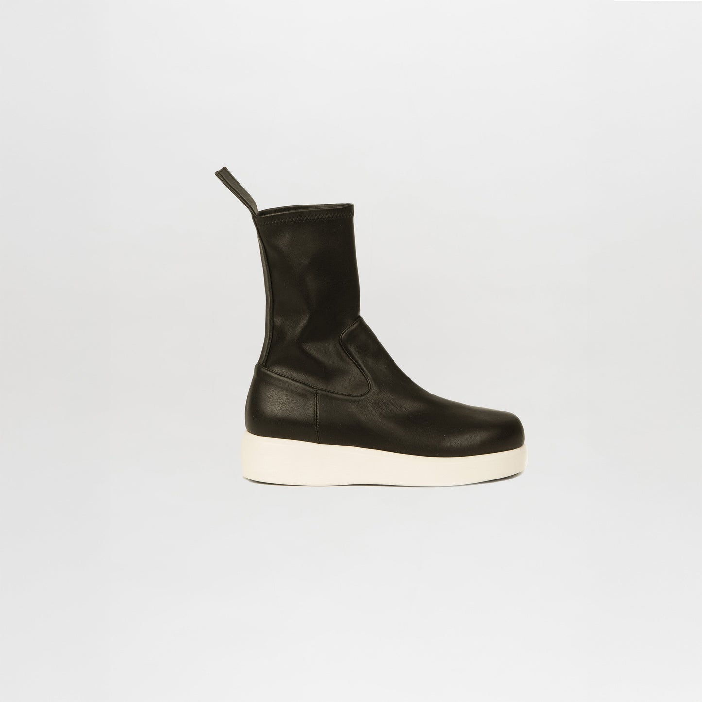 The Baia Boots Black by Gia Borghini are crafted from black calf leather, featuring a pull tab and thick white sole, shown against a plain light background.