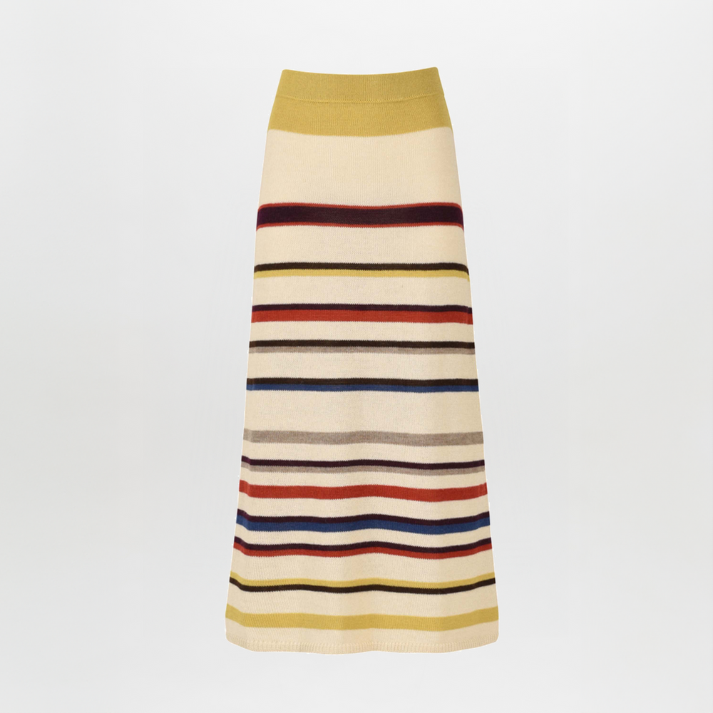 A person wearing the Brie Skirt in Multi Mustard Stripe, paired with strappy sandals, enjoys the comfort of sustainably dyed fabric.