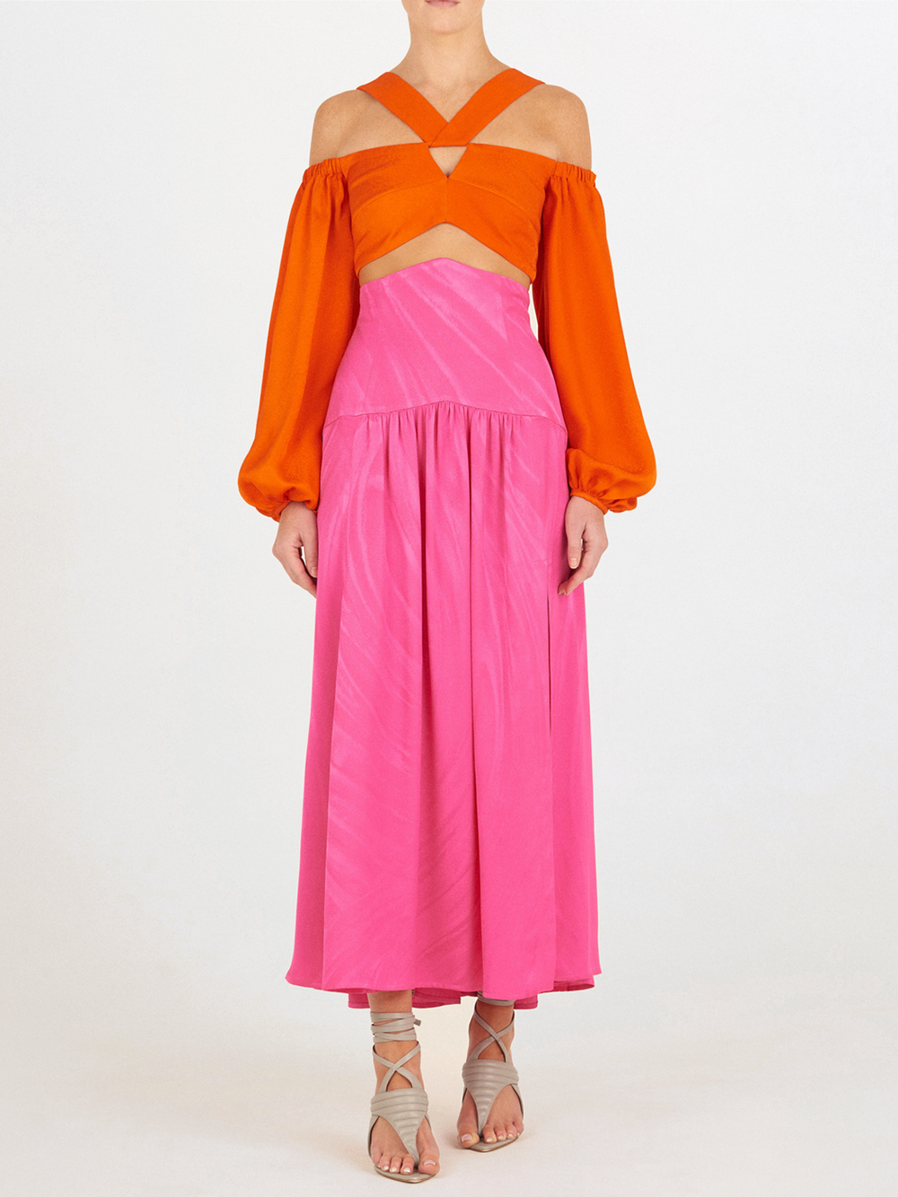 Bright pink sleeveless dress with a high neckline and a full-length, Callie Skirt Fuchsia, displayed on a white background.