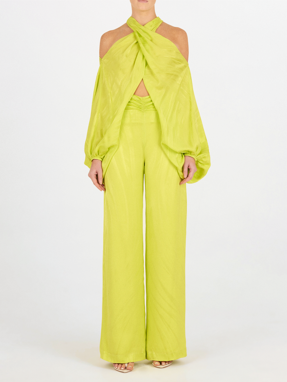 A woman's Casey Pant Verde Lime, wide-leg, flattering drape pants.