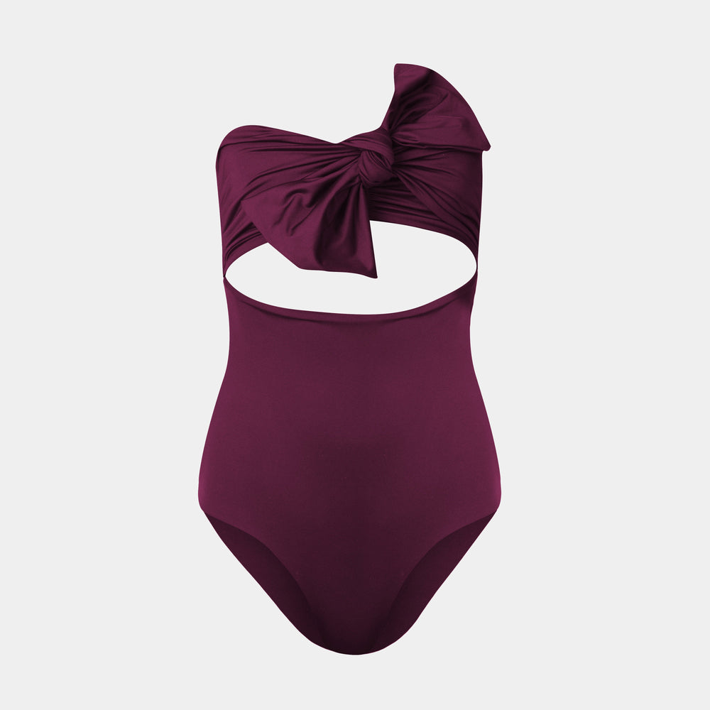 Costanzo One Piece Plum swimsuit with a cut-out design and a Silvia Tcherassi bow detail at the bust.