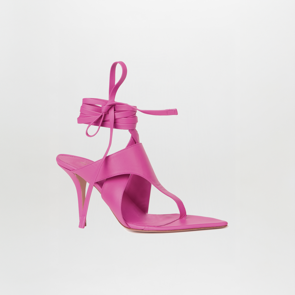 Introducing the Domenico Heels Magenta by GIA Couture—striking high-heeled sandals in magenta Italian leather, featuring a square toe, a single foot strap, and long ankle wrap laces.