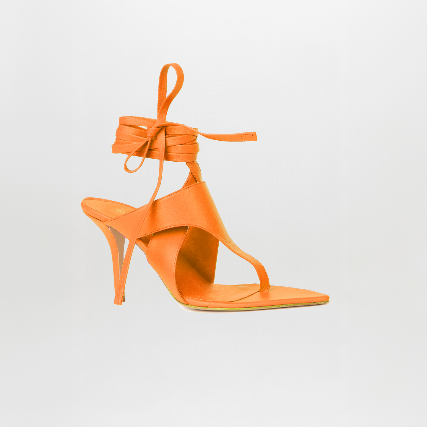 The Domenico Heels Orange by GIA Couture are orange Italian leather sandals featuring a high heel, open toe, square sole, and ankle wrap laces, showcased on a plain white background.