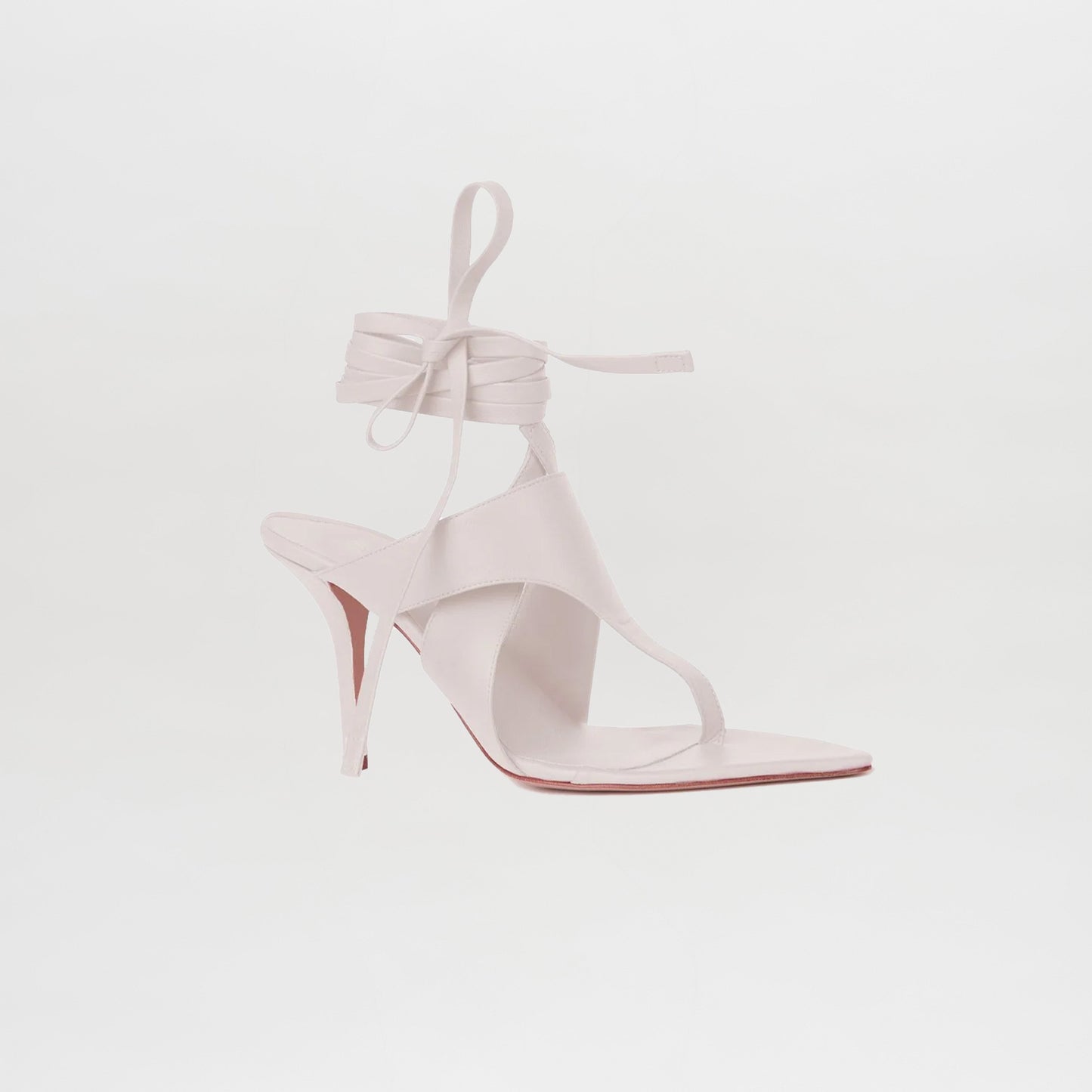 The Domenico Heels White by GIA Couture are Italian leather sandals with an open toe, square sole, and elegant ankle wrap-around straps, shown on a plain white background.