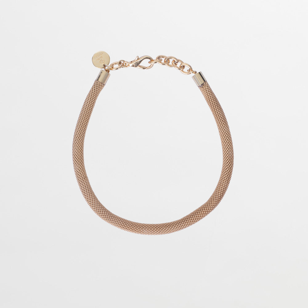Presenting the Elara Necklace: a stunning gold-plated brass piece featuring a chocker mesh design, secure lobster clasp, and elegant round charm. This exquisite Tcherassi accessory is perfect for elevating any ensemble with its sophisticated allure.