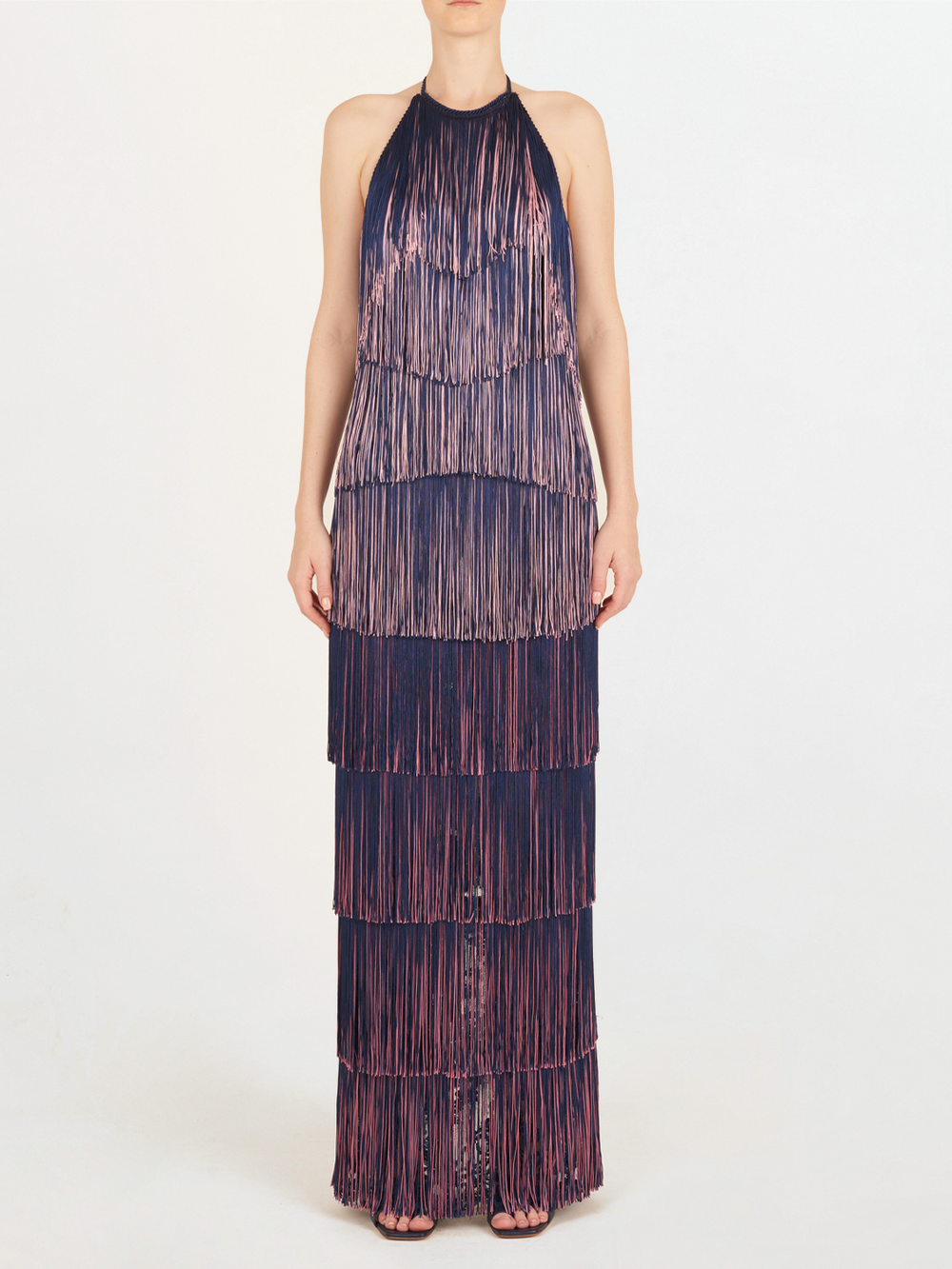 A floor-grazing fringed Paris Dress Navy with a touch of glamour in blue and pink hues.