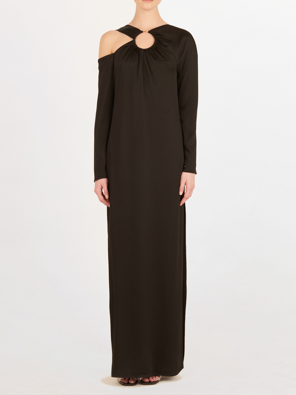 A timeless Turin Dress Black with elegant simplicity, featuring a cut out shoulder.