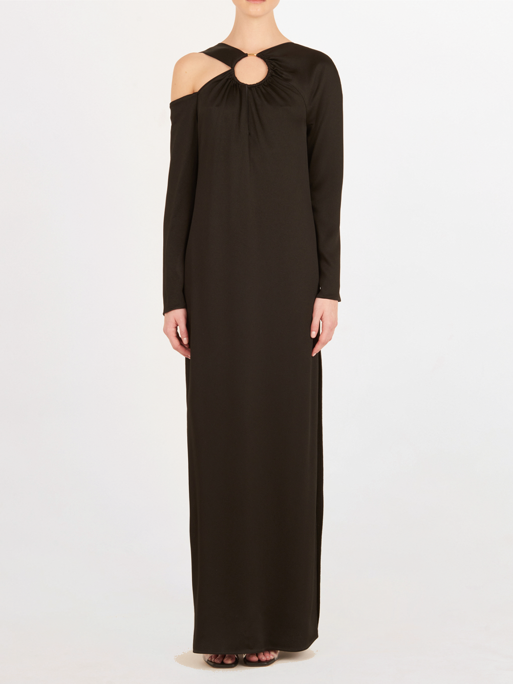 A timeless Turin Dress Black with elegant simplicity, featuring a cut out shoulder.