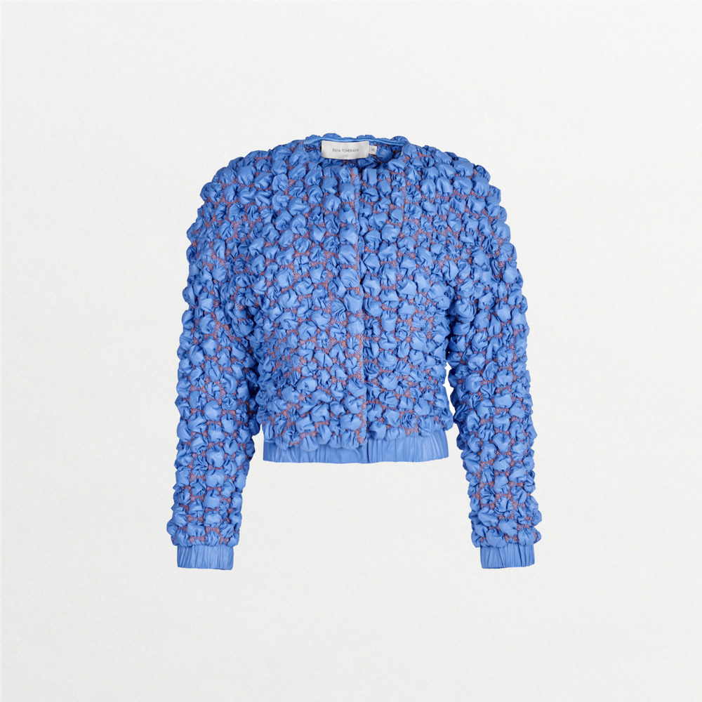 A Gieti Jacket Celeste with elastic cuffs on the sleeves.