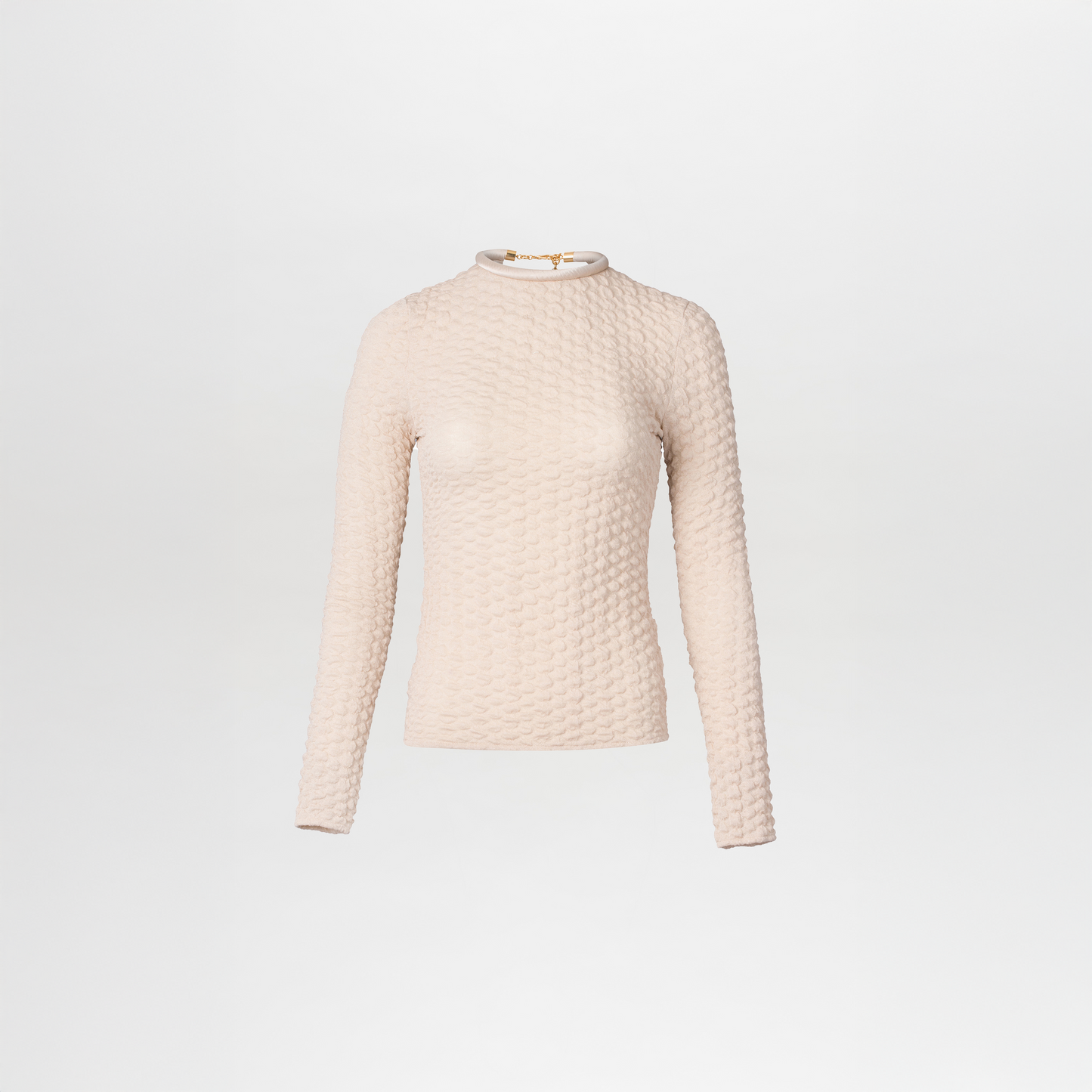 The Jari Top is a light beige, textured fabric long-sleeve with a high neckline and a fitted silhouette, set against a plain white background.