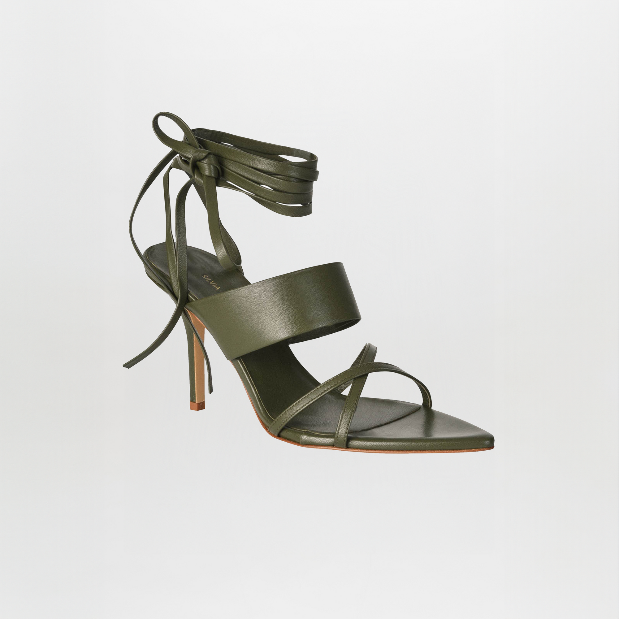 Jimena Heels Olive by Silvia Tcherassi, made from Italian calf leather, feature ankle wrap laces, a wide front strap, and slim toe and heel straps, shown against a plain white background.