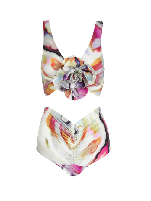 A Merve bikini top + Kirsten with a floral print made of swim fabrics.