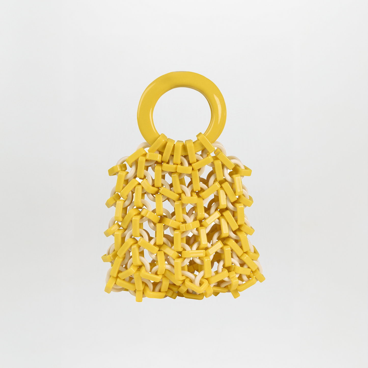 The Omegna Handbag Yellow/White features large circular handles and a chunky, knit-like resin net design, shown on a plain white background.