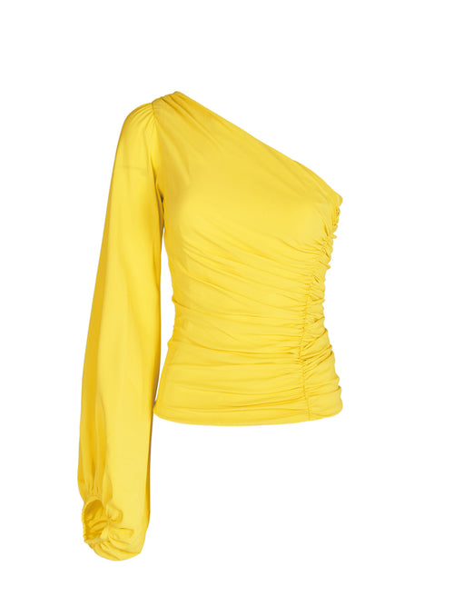 A Oriana Blouse Yellow made of georgette fabric.