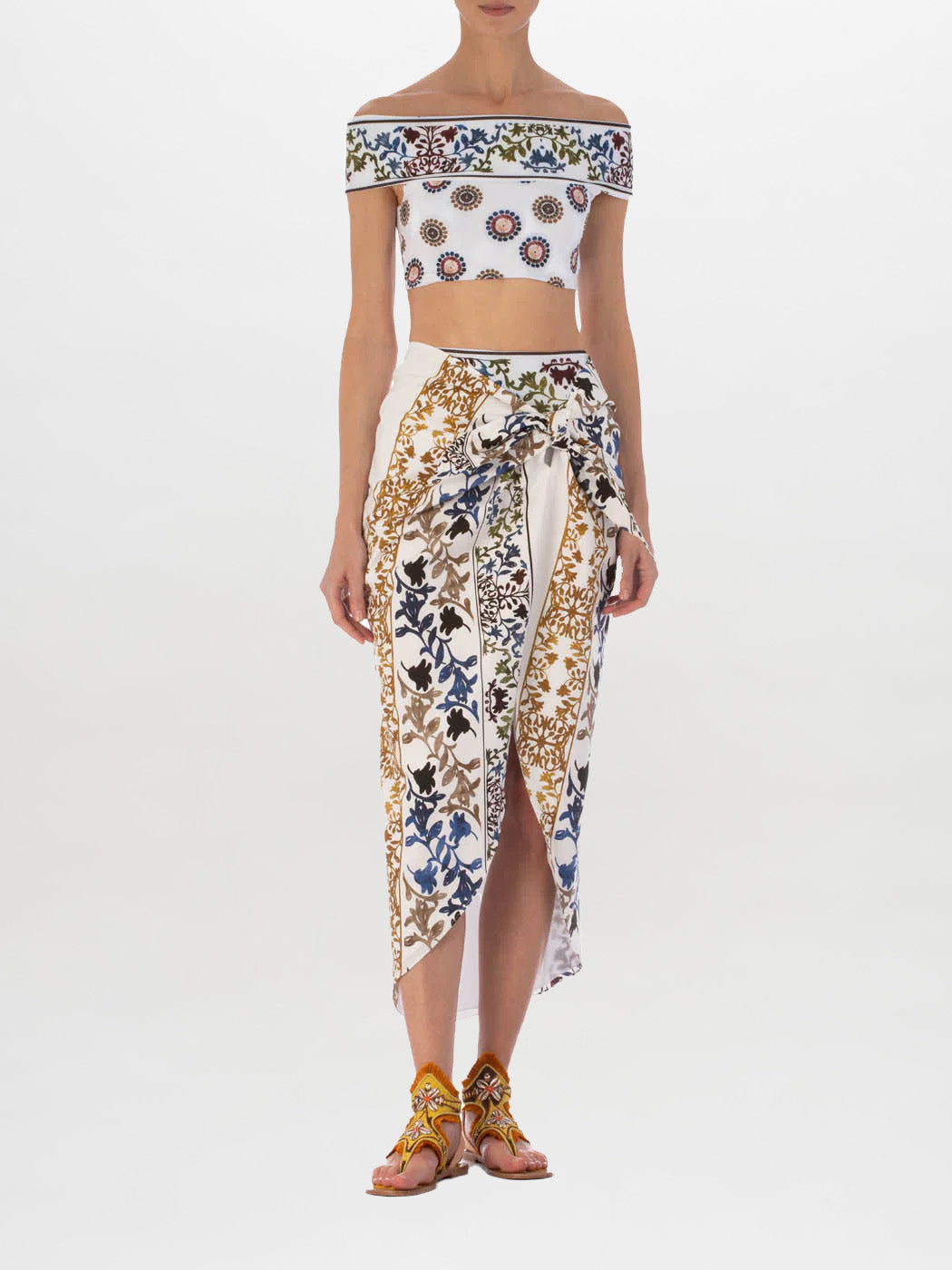 Patmos Pareo Skirt Multi Sepia Floral with a bow tie at the front, isolated on a white background.