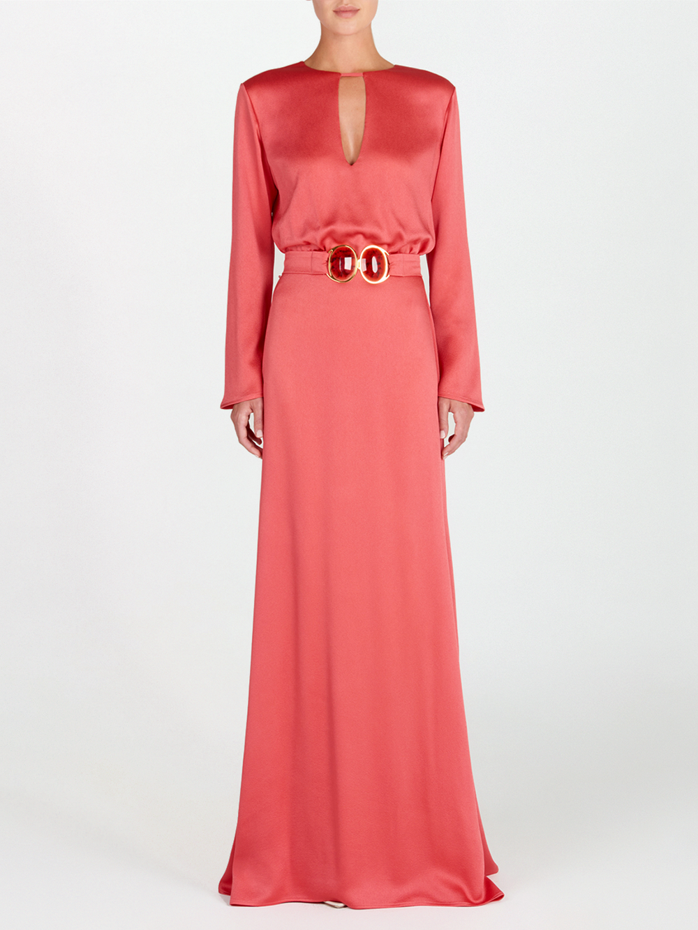 A sleek Ravenna Dress Coral floor-length dress with a belt.