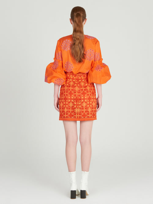 Idalia Skirt Red Orange Crochet with a floral pattern, displayed on a plain white background.