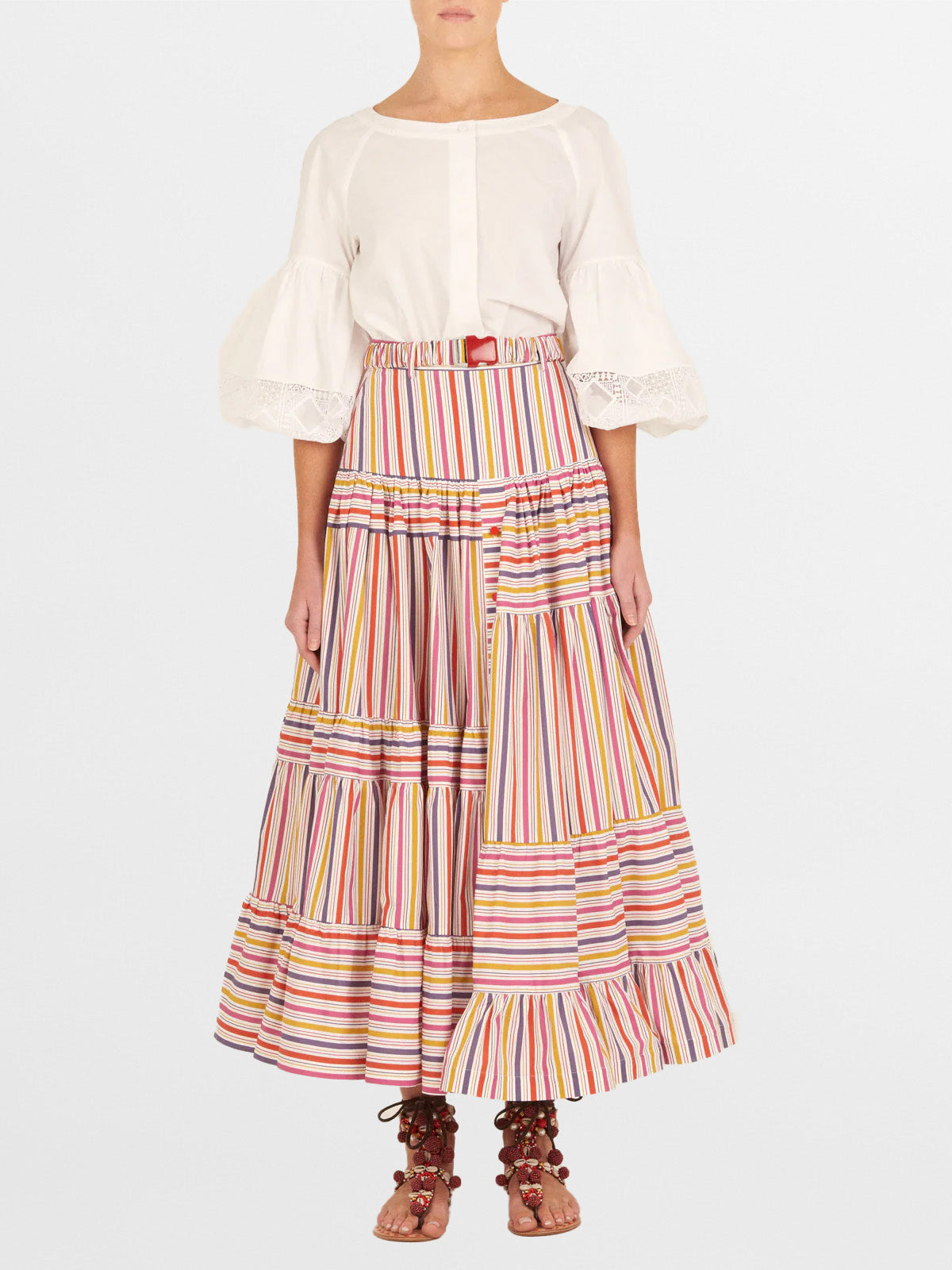 The Magnolia Skirt Golden Magenta Stripes by Silvia Tcherassi features colorful stripes and ruffles for a playful look.