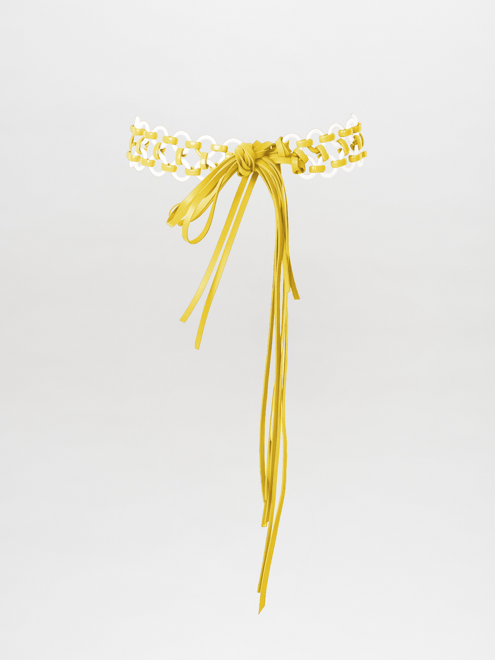 A Sindione Belt in yellow and white, complete with long dangling tassels, is elegantly displayed against a white background.