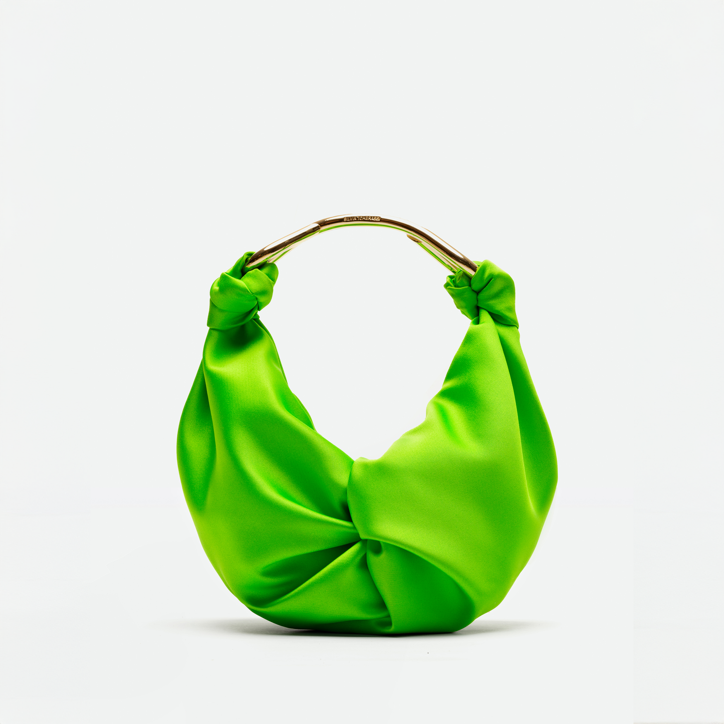 The Sofia Bag Small kelly green is a bright green handbag in luxurious doppio raso with a knotted design and curved gold-tone handle, displayed against a plain white background.
