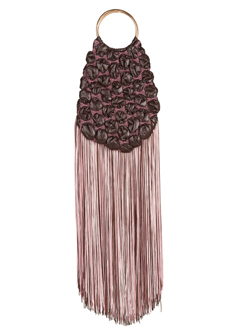 A Toblach Bag Brown with fringes hanging from it can be ordered online and shipped within a few days.