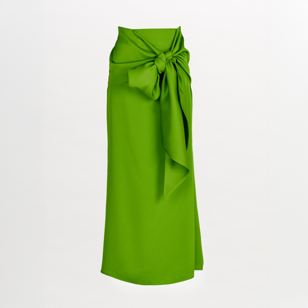A Trento Skirt Lime with a bow, midi-length.