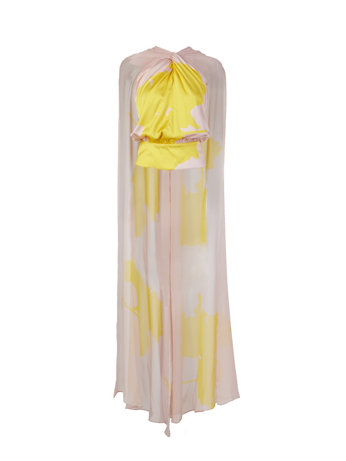 A Vicenta Blouse Yellow Nude with a chiffon cape.