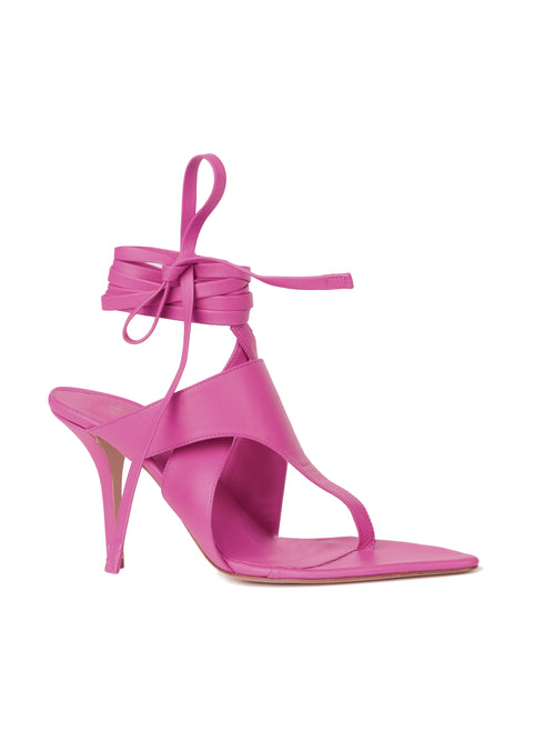 A pink Domenico Heels Magenta with a wraparound ankle strap, isolated on a white background.