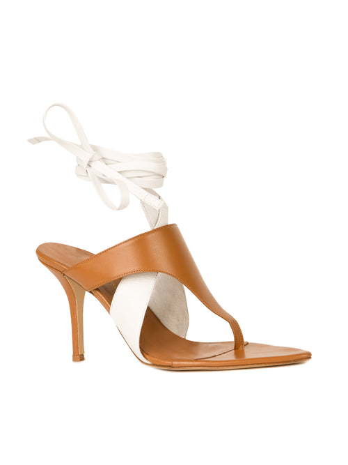 A stylish Domenico Heels Beige/White high-heeled sandal featuring white and tan Italian leather straps with a lace-up ankle tie, isolated on a white background.