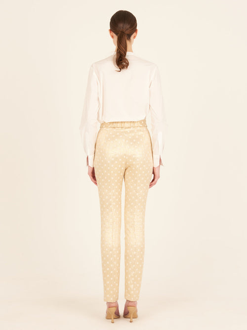 A sophisticated Isabel Blouse White with gold embroidery.