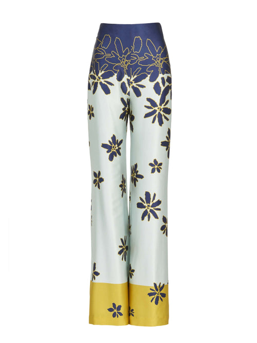 A Como Pant Navy Citrine with a flared bottom.