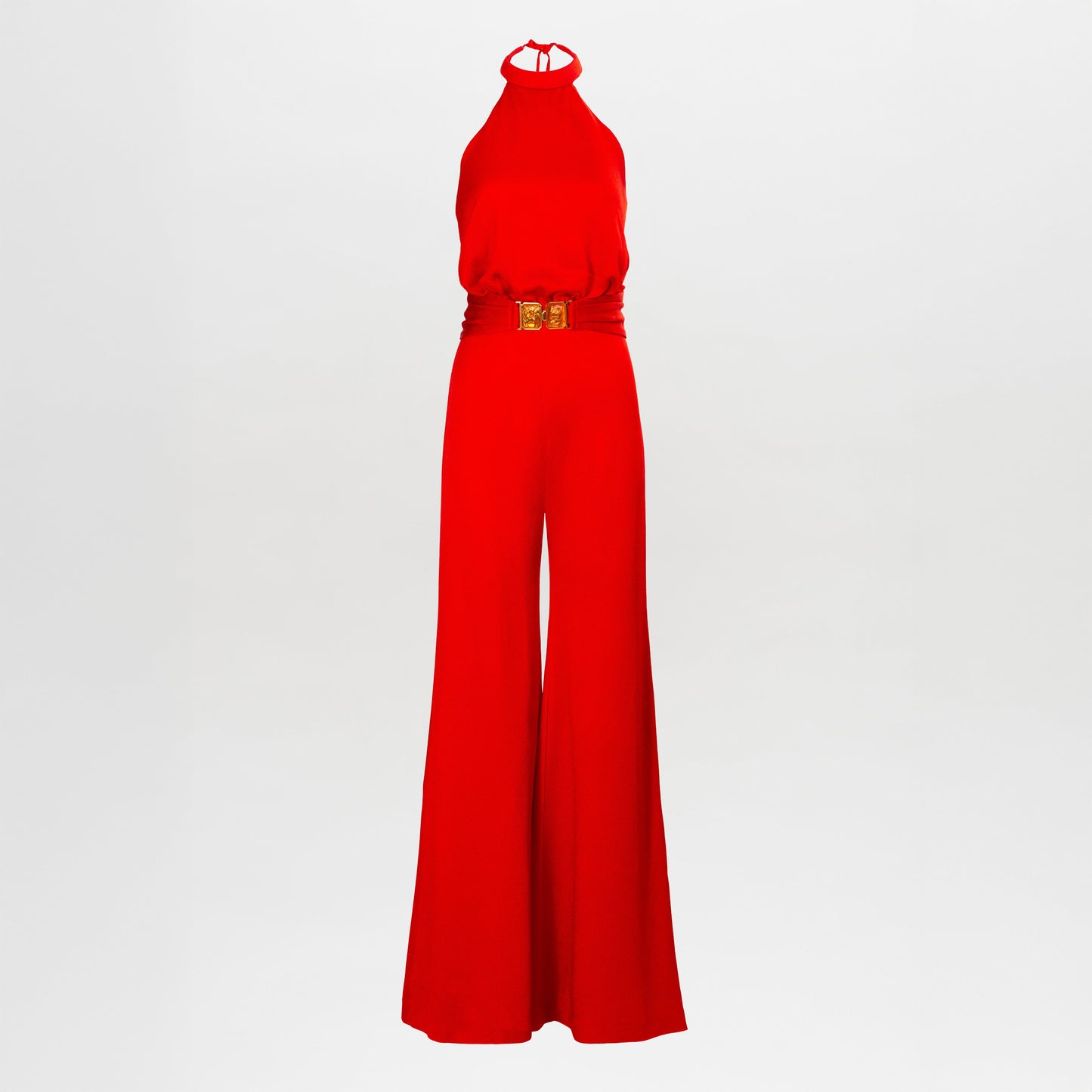 The Kaede Jumpsuit is a red halter-neck design featuring wide-leg pants and a gold-buckled waist belt, shown against a plain white background.