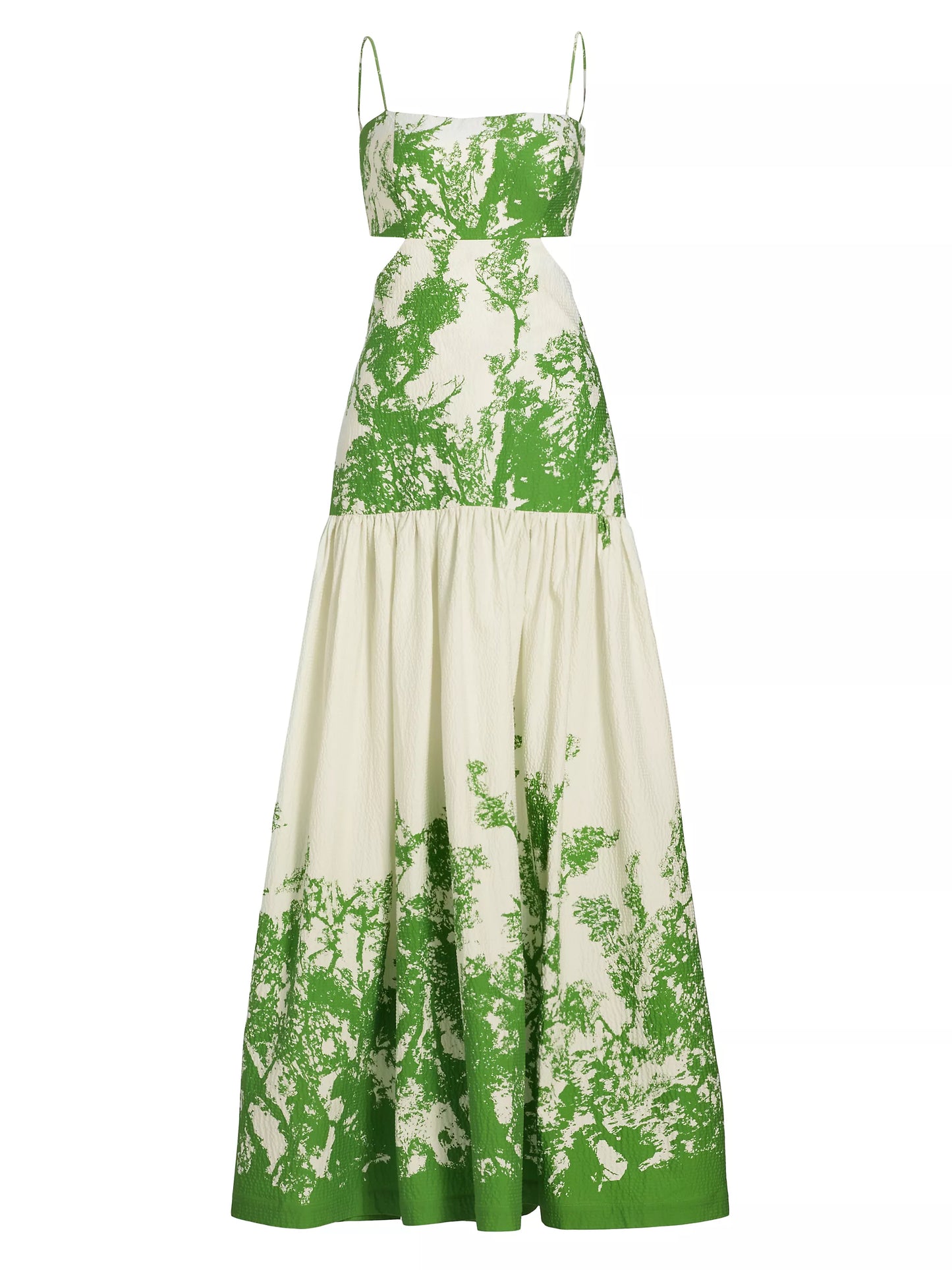 A Shannon Dress Green Cyprus with green leaves on crinkled cotton fabric.