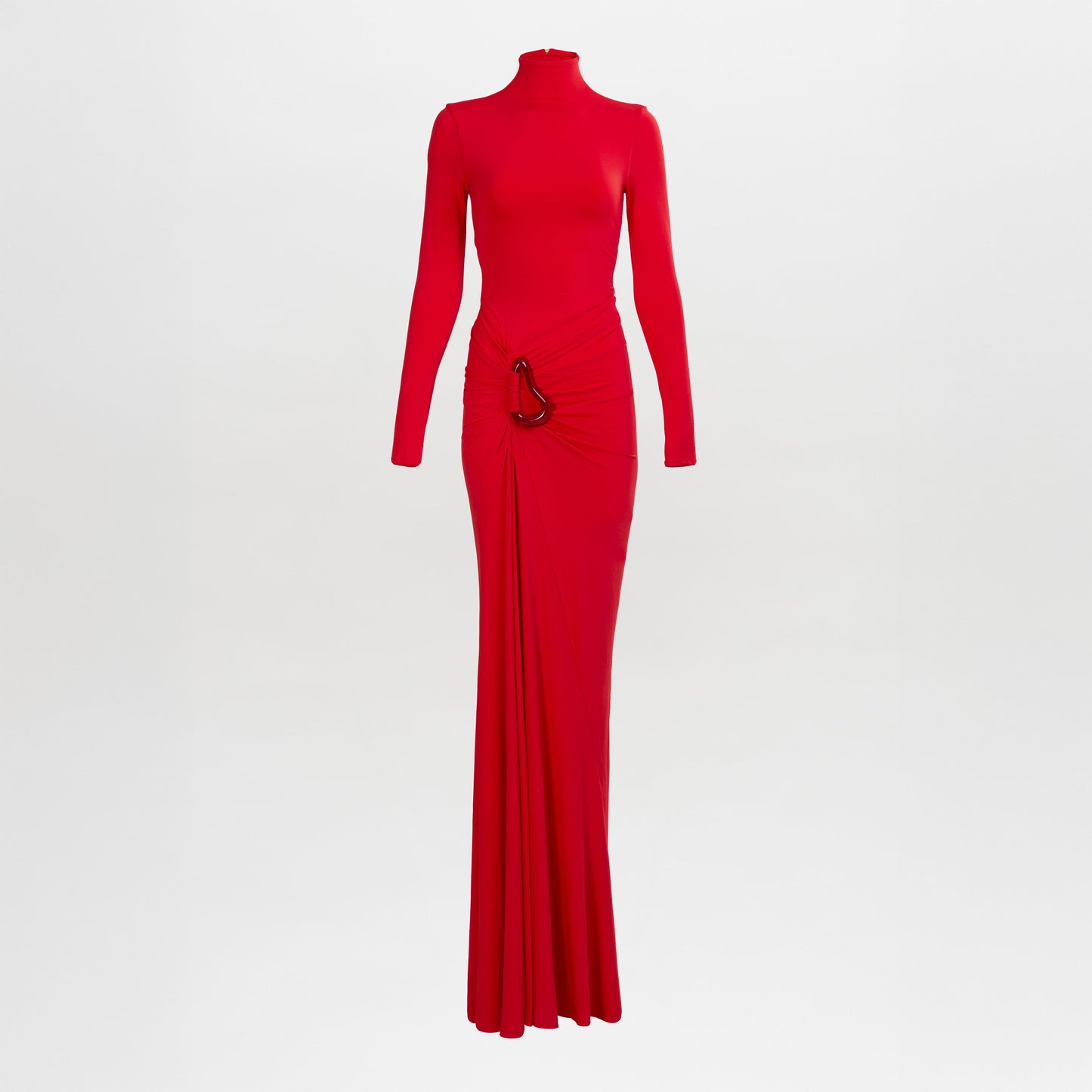 The Lena Dress is a long-sleeved, floor-length red gown with a high neckline, ruched waist detail, and metallic embellishment.