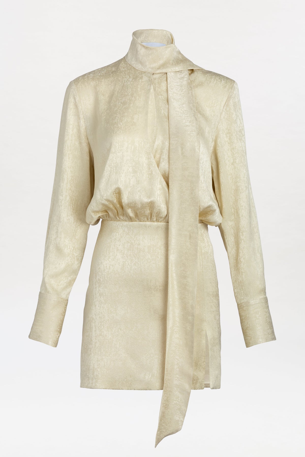 The Imelda Dress is a gold metallic long-sleeve mini dress with a high neck and attached scarf detail, featuring a fitted waist and a slight sheen, displayed on a plain white background.