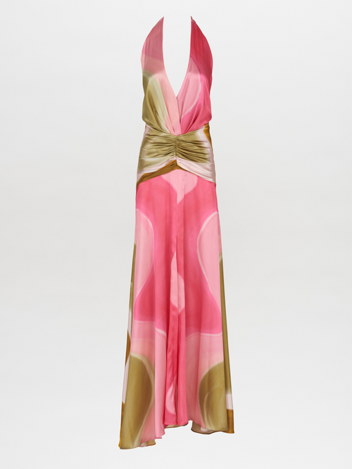 A sleeveless, floor-length Dafne Dress Olive/Pink with a halter v-neckline, in a pink, white, and green abstract pattern. The waist is accentuated with a gathered detail.