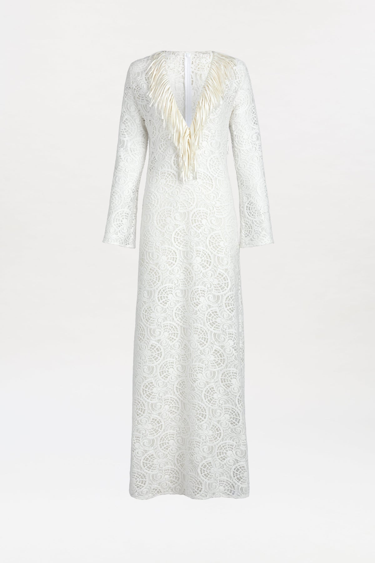The Vilma Dress is a long-sleeved, floor-length white lace gown featuring a deep V-neckline embellished with cream-colored feather details, showcased against a plain white background.