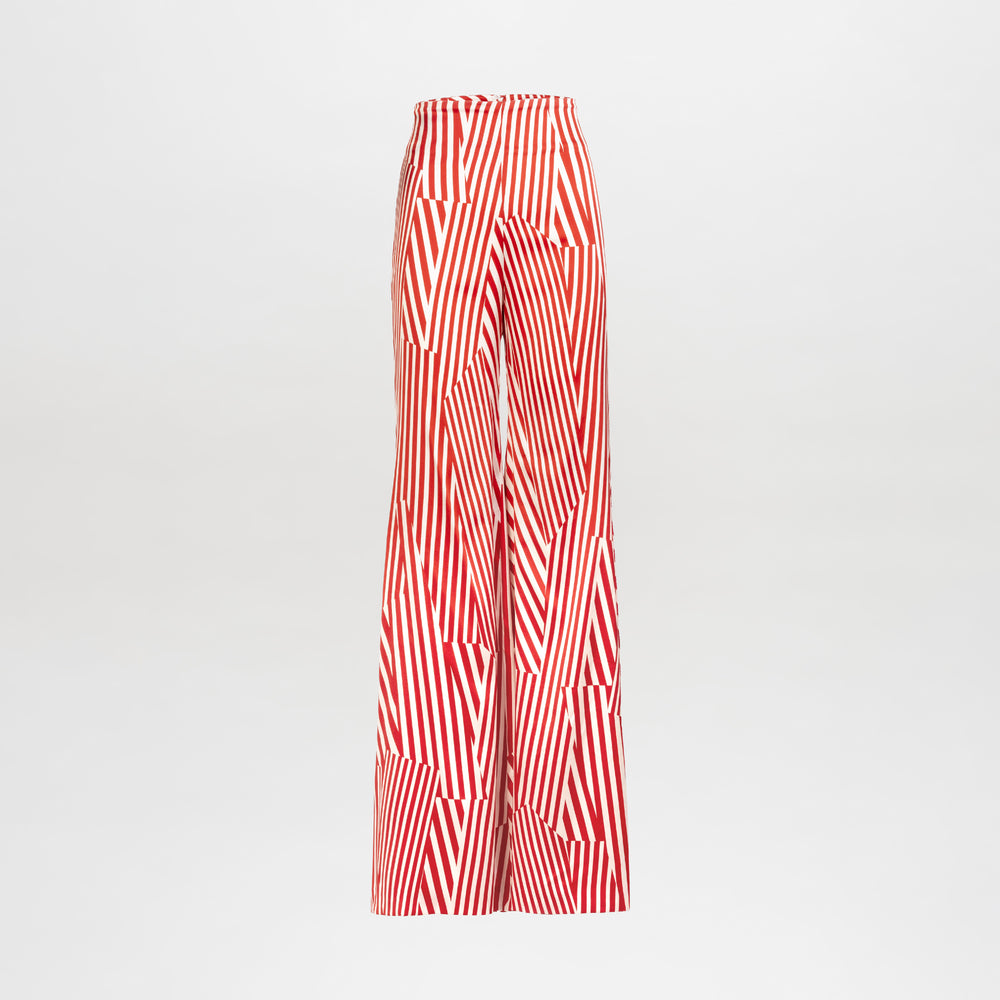 The Andie Pant is a high-waisted, wide-leg style made from premium Italian fabric with bold red and white diagonal stripes in a geometric pattern on a plain white background.