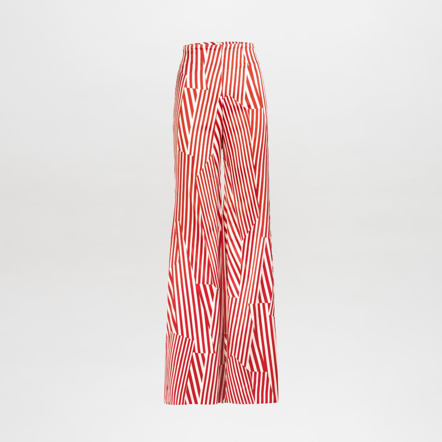 The Andie Pant is a high-waisted, wide-leg style made from premium Italian fabric with bold red and white diagonal stripes in a geometric pattern on a plain white background.