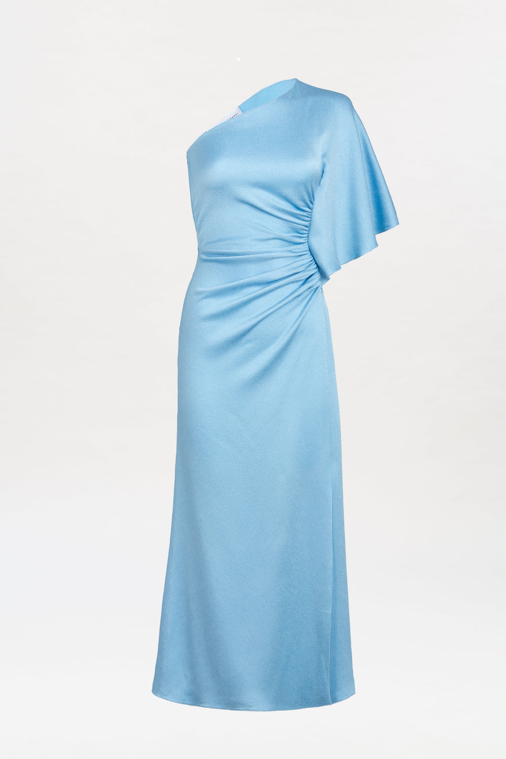 The Oby Dress is a floor-length gown in light blue, featuring one short sleeve and one sleeveless side. Made from subtly shiny fabric, it gathers at the waist to create an elegant draped effect. The dress is shown against a plain white background.