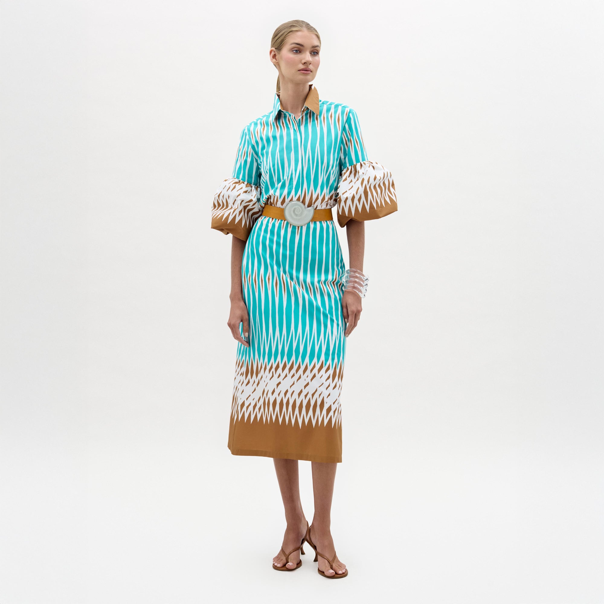 61___Atira_Skirt___Abstract_Aqua_Print___PRE_SPRING_2026_FRONT_3601e178-3aa9-415c-837a-4254157e5f23