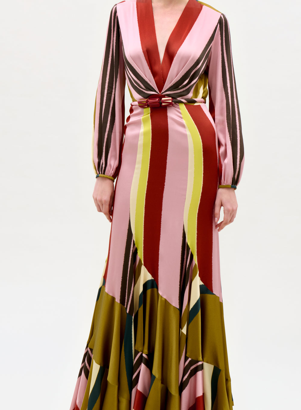 Colorful striped dress with a V-neck and long sleeves on a white background