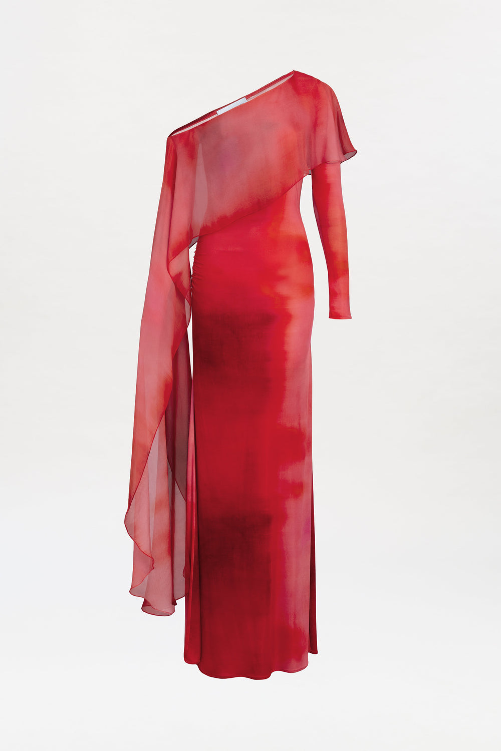 The Maddy Dress is a floor-length, one-shoulder red gown featuring sheer fabric and an asymmetrical draped sleeve, showcased against a white background.